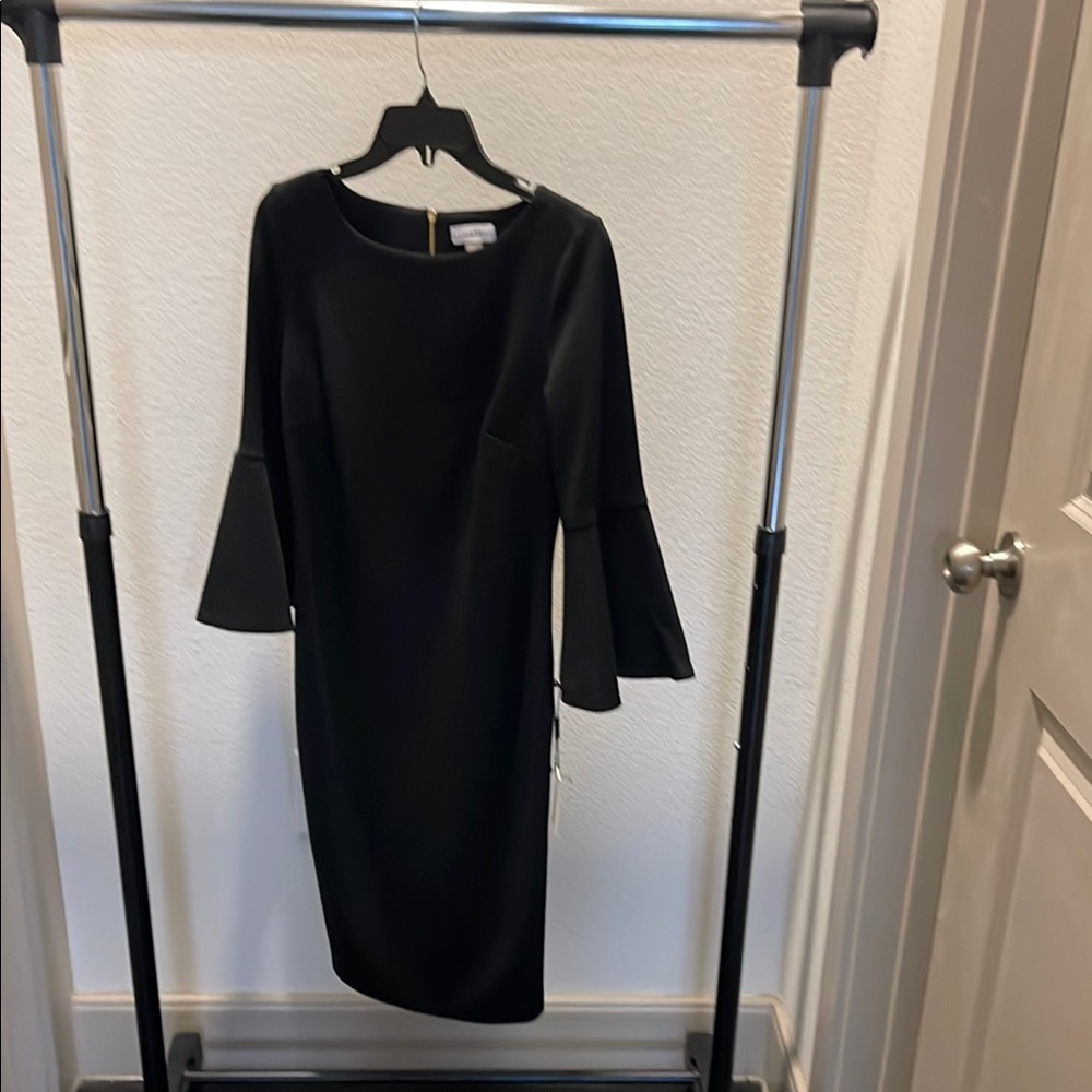Chic Black Dress with Flared Sleeves